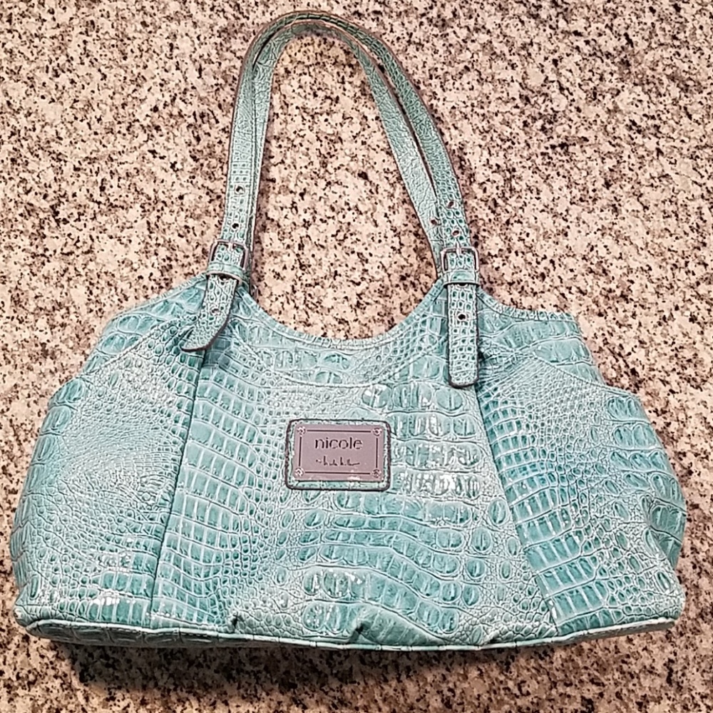Light blue barely used women's hand bag